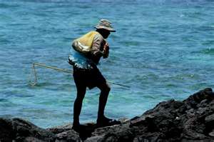 man walking on rocks